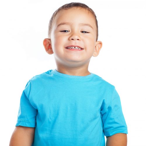 cheerful child smiling on white a background